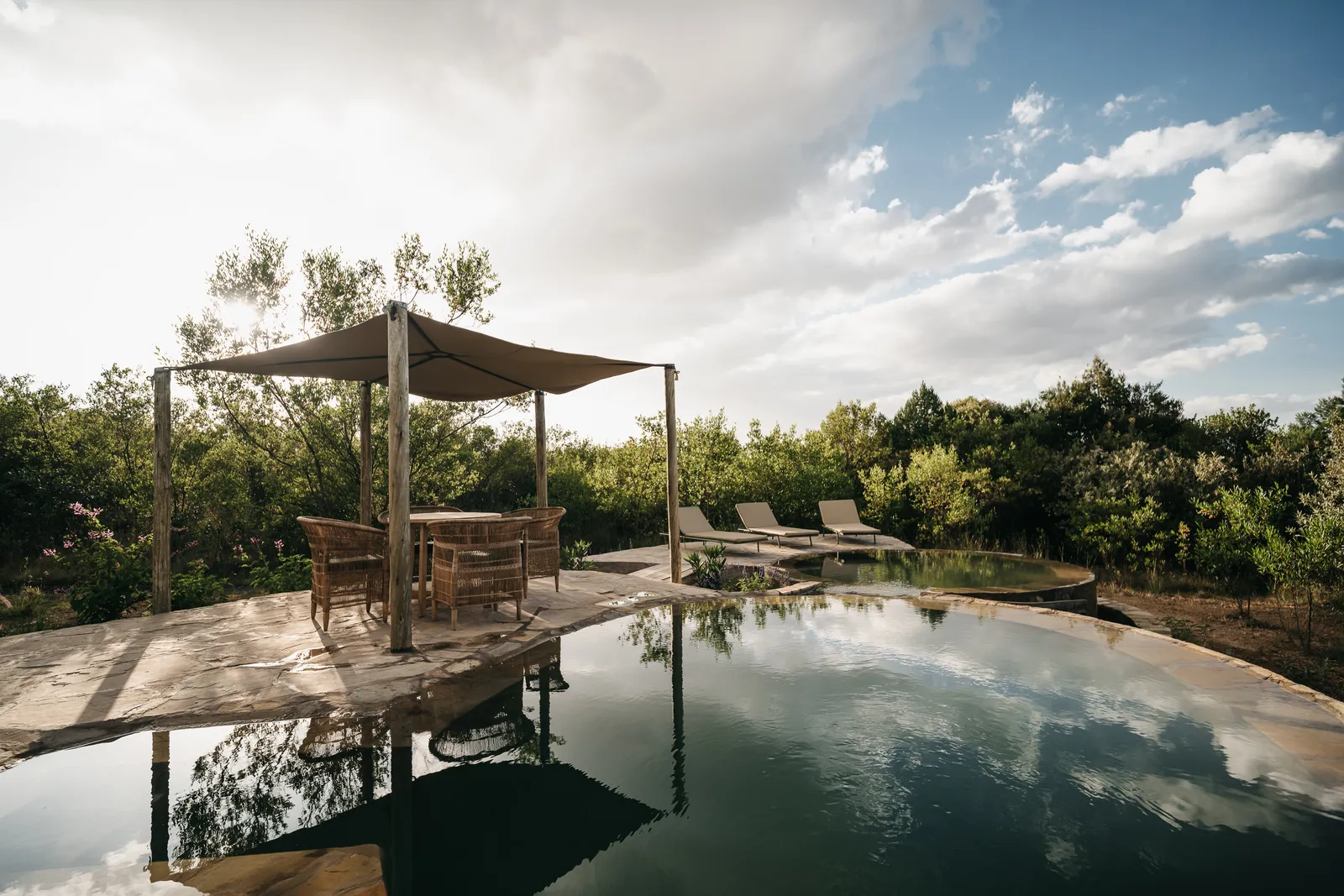 The saltwater pool at Kilima Gardens in the late light