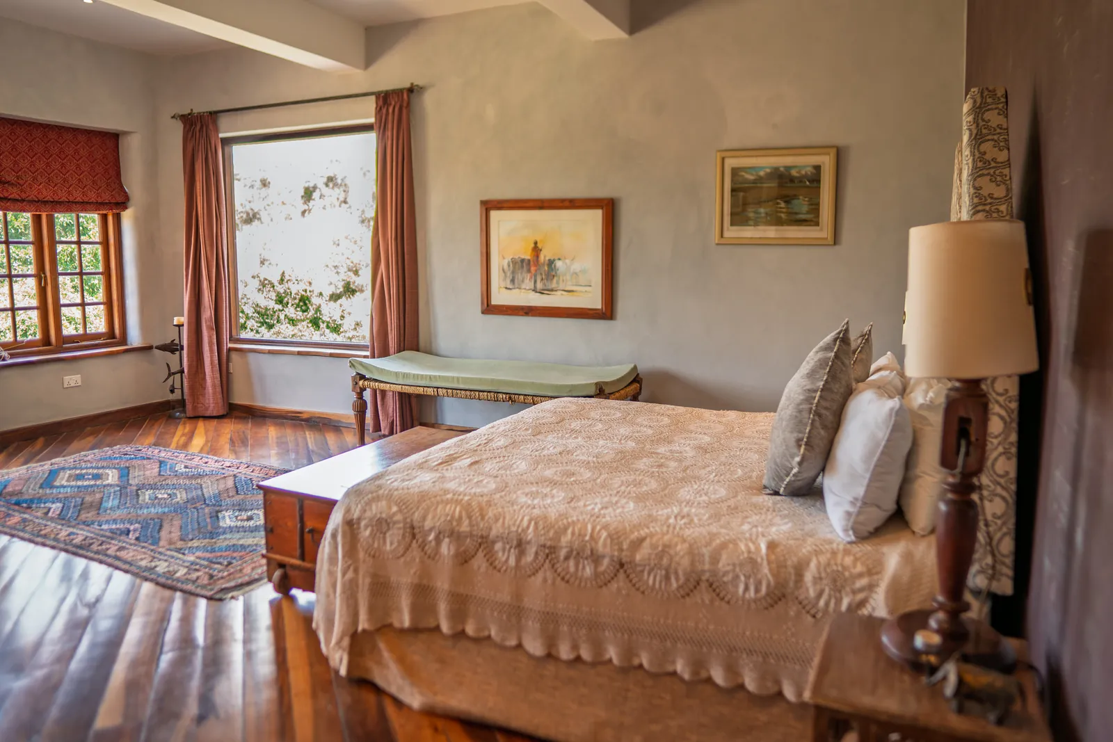 A bedroom at Asili House with views from the window